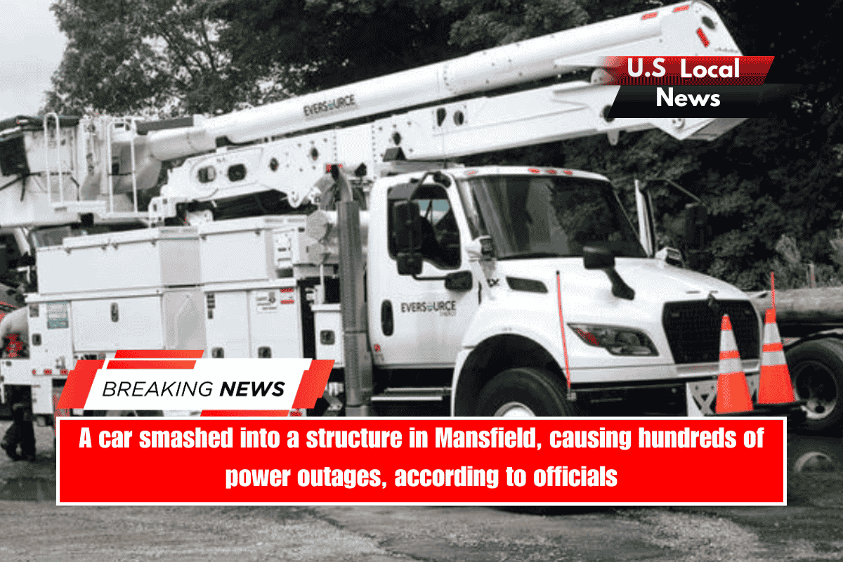 A car smashed into a structure in Mansfield, causing hundreds of power outages, according to officials.