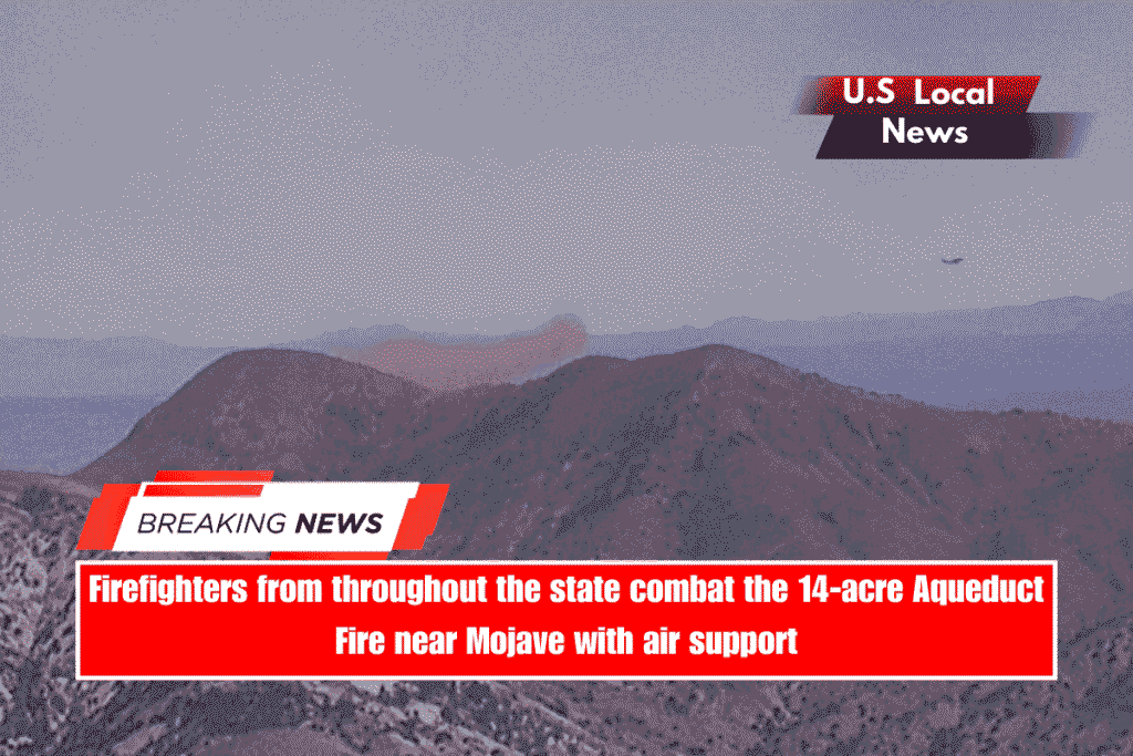 Firefighters from throughout the state combat the 14-acre Aqueduct Fire near Mojave with air support