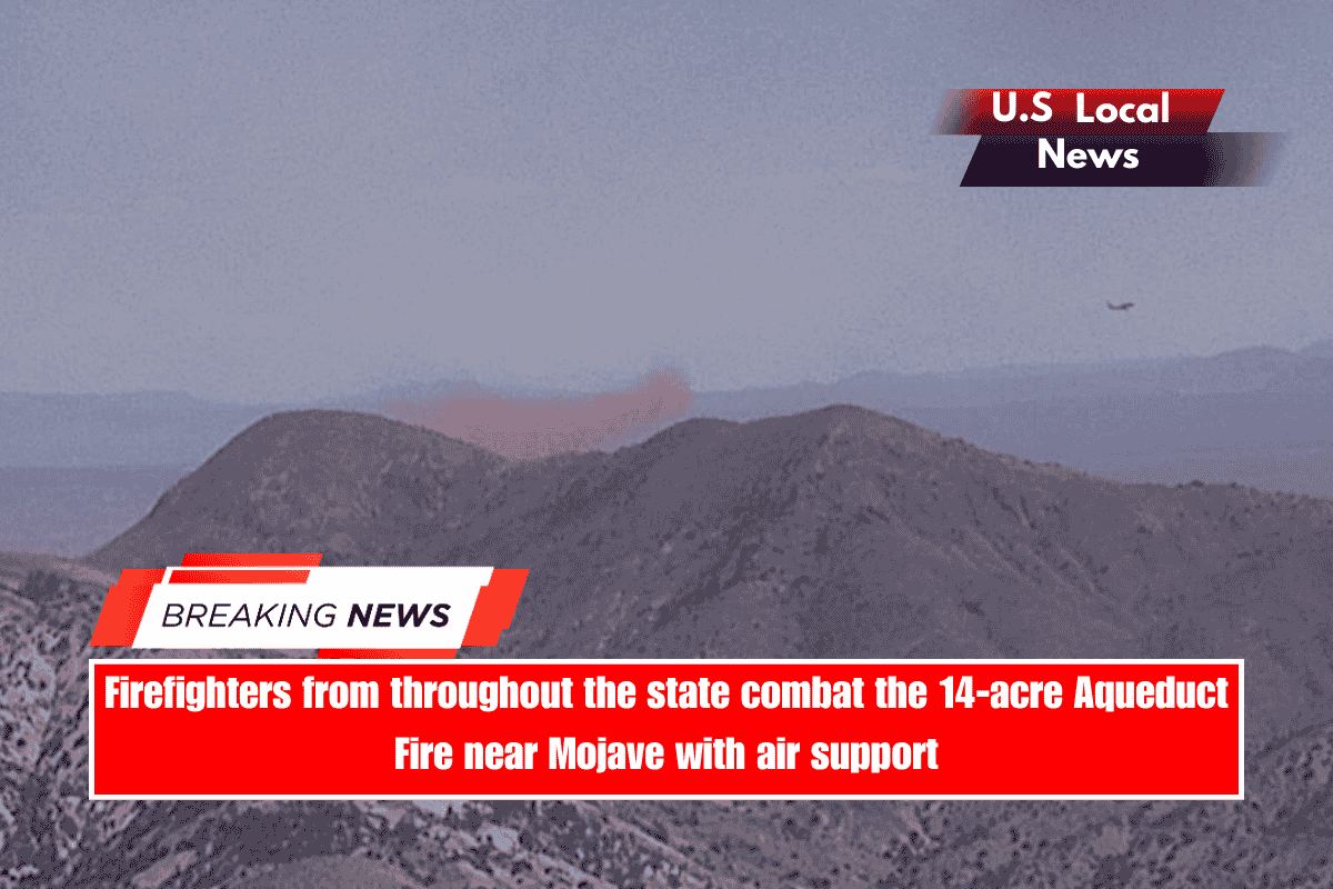 Firefighters from throughout the state combat the 14-acre Aqueduct Fire near Mojave with air support